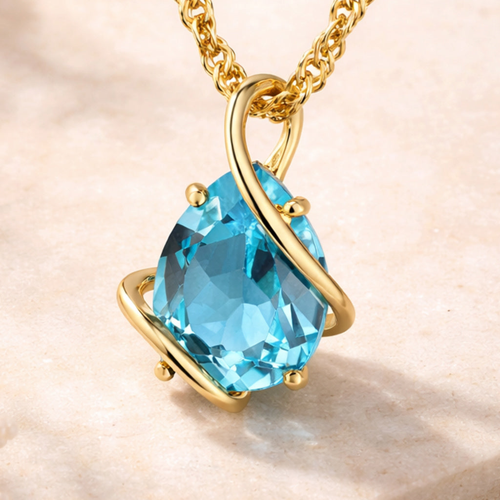 Damen Anhänger mit Kette aus 375er Gelbgold mit Blautopas - Singapurkette