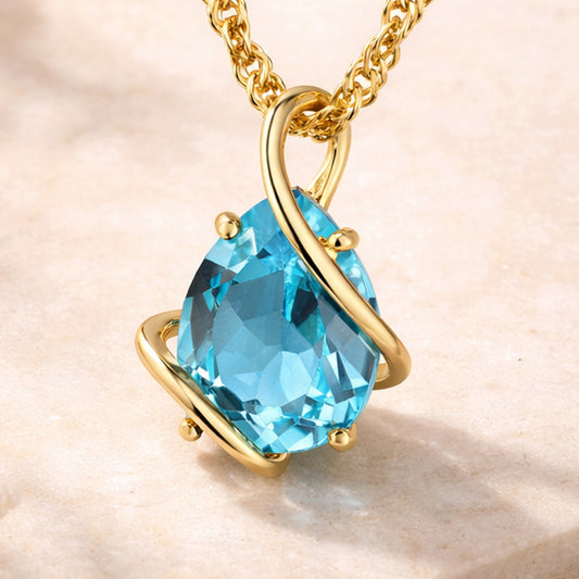 Damen Anhänger mit Kette aus 375er Gelbgold mit Blautopas - Singapurkette