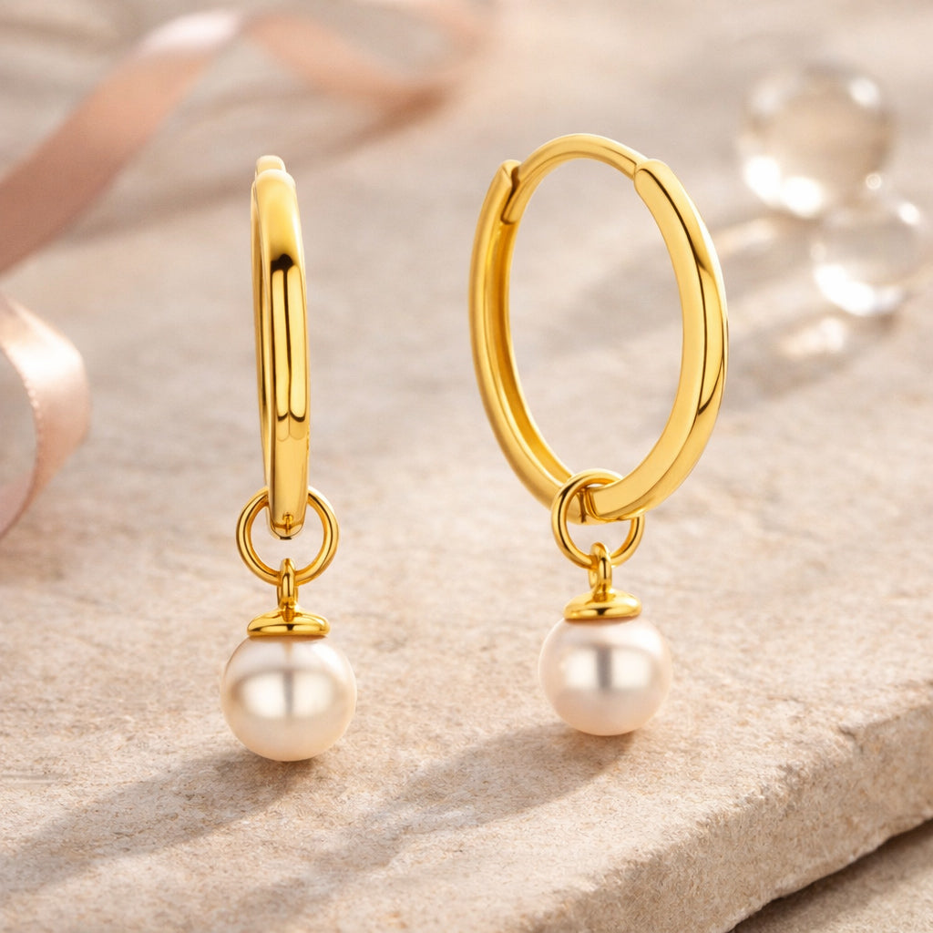 Klappcreolen aus 585er Gold mit SW-Zuchtperle
