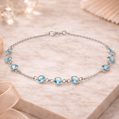 925 Silber Armband mit 9 blauen Zirkonia Steinen
