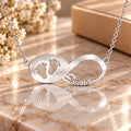 Infinity Namenskette mit Babyfüße - 925 Sterling Silber - Silber | Vergoldet | Rosévergoldet mit Wunschname