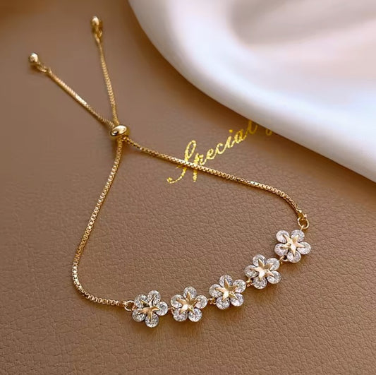 Armband aus Edelstahl, mit Stern und Blume