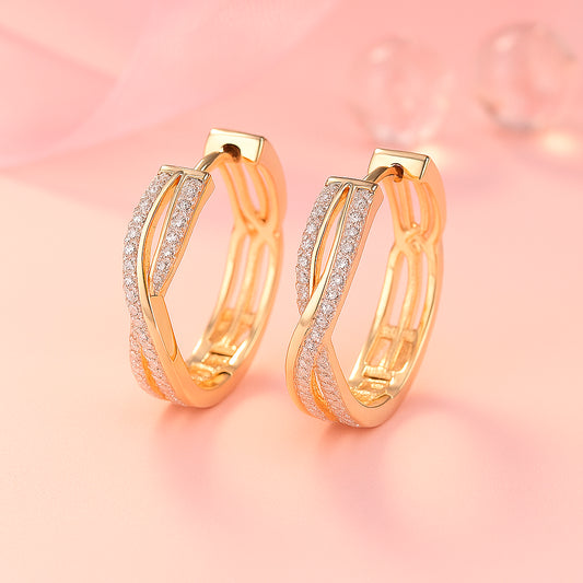 Ohrringe aus Edelstahl, vergoldet, gedrehte Zirkonia Creolen