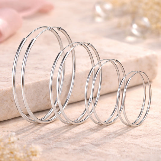 Damen Ohrringe Modeschmuck Creolen rund silberfarben glatt glänzend - verschiedene Größen