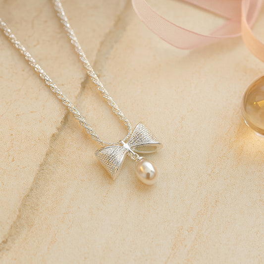 Kette mit Anhänger aus 925er Sterling-Silber, Schleife mit Perle