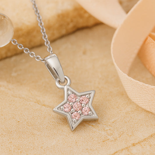 Silberne Halskette mit Sternanhänger und rosa Zirkonia - filigraner Damenschmuck mit funkelndem Sternmotiv.
